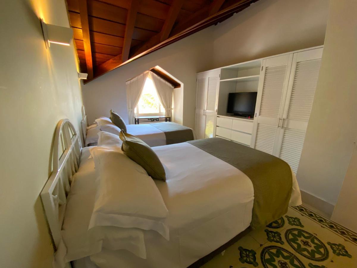 Hotel Las Americas Casa De Playa Cartagena Eksteriør bilde A room at the hotel