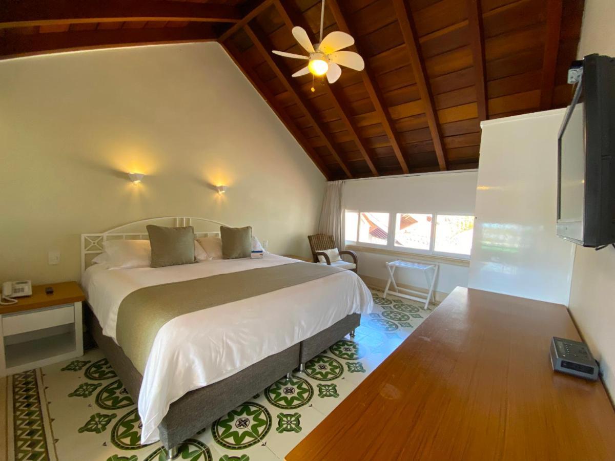 Hotel Las Americas Casa De Playa Cartagena Eksteriør bilde A room at the hotel